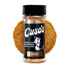 Cuso Cuts Dust BBQ Seasoning bottle on counter adds bold, smoky flavor to steaks