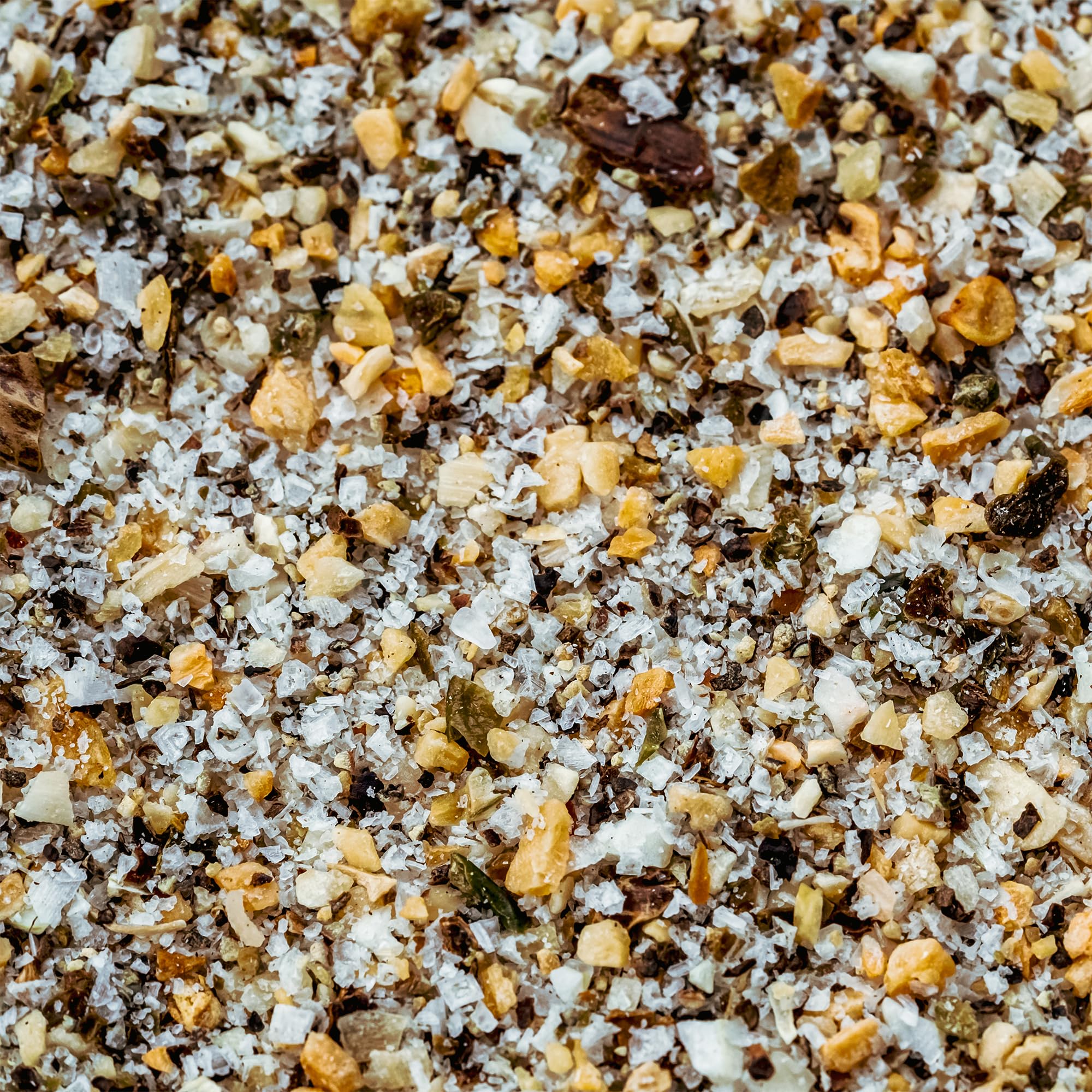 Cuso Cuts Gravel BBQ Rub vegetables on grill with seasoning