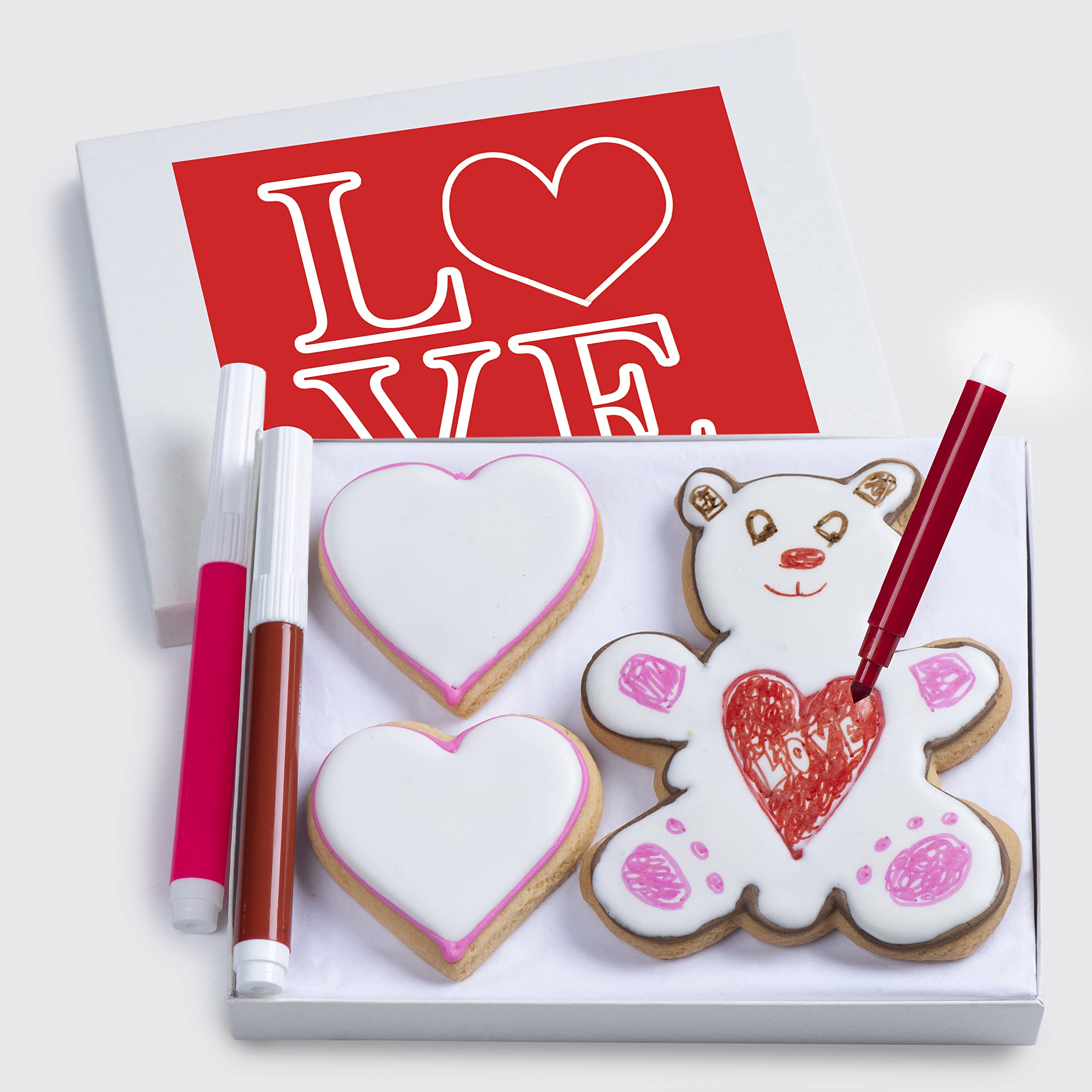 Custom Cookies Valentines basket with hand-decorated cookies and edible markers for kids' decorating fun.