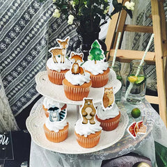 Cyodoos edible animal toppers featuring the zebra design brighten safari-inspired cupcakes.