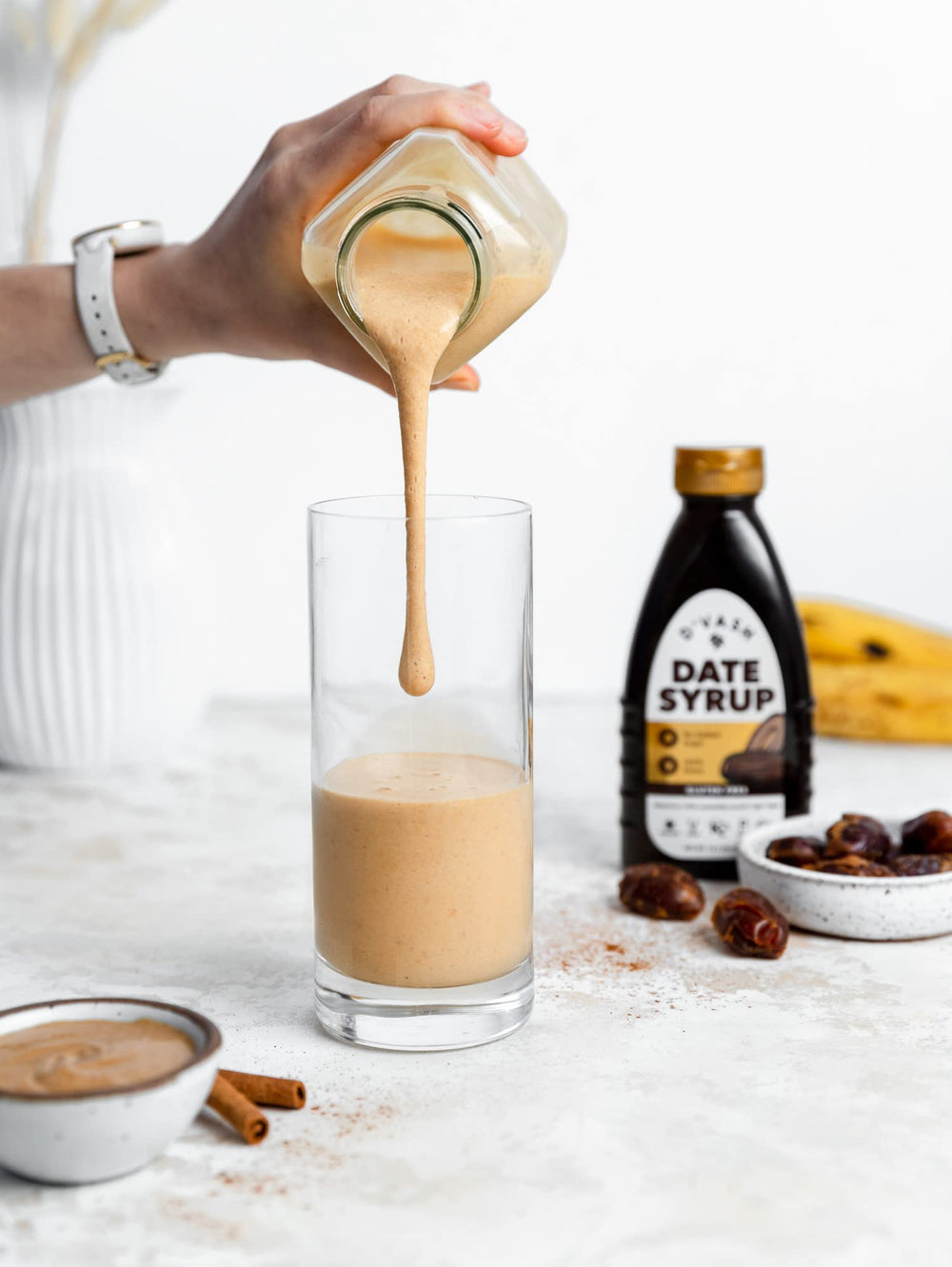 D'Vash Date Syrup over pancakes shows natural sweetness.