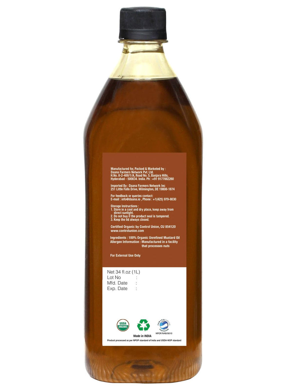 Amber DAANA mustard oil bottle on kitchen counter