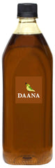 Pouring DAANA mustard oil for sautéing and flavoring dishes