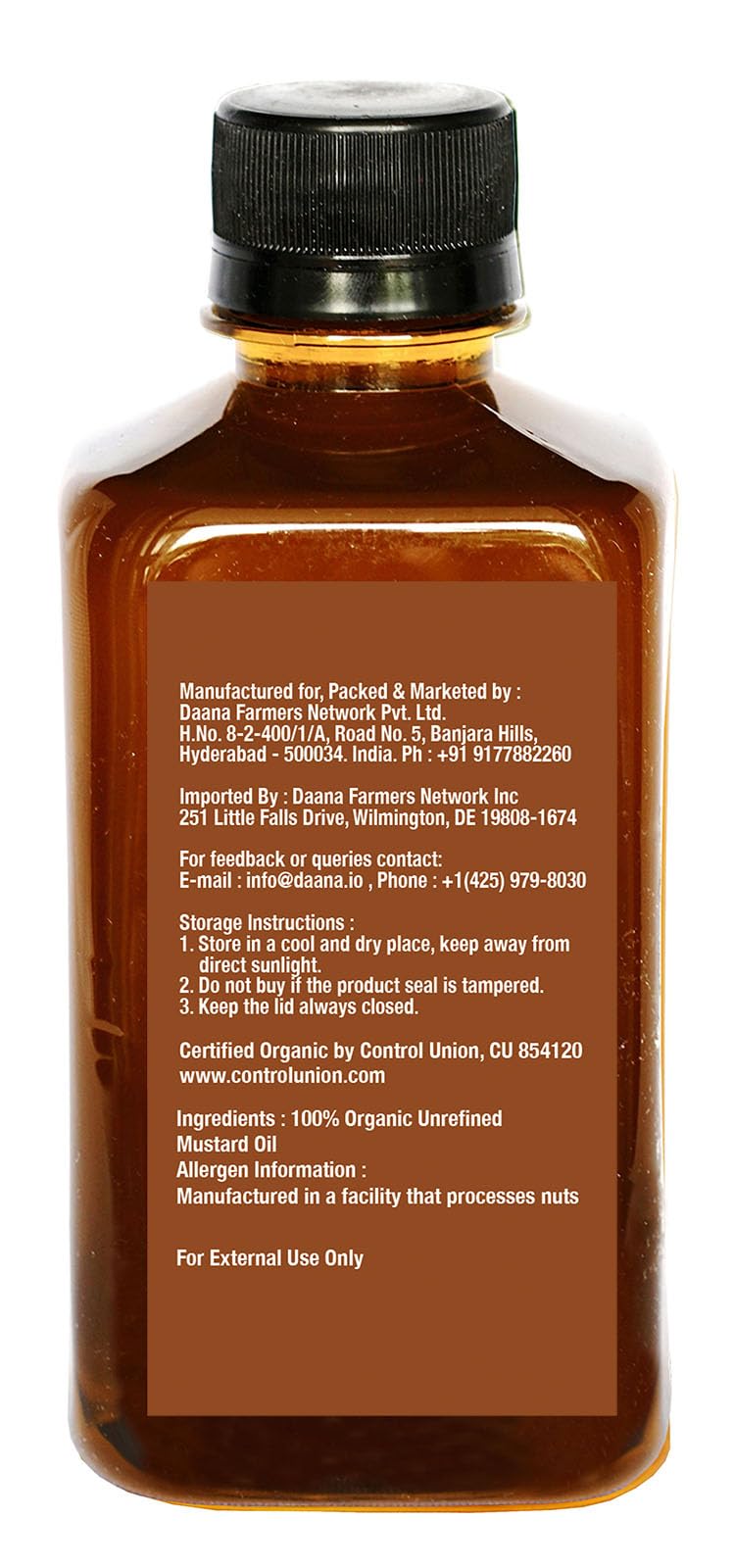 Daana Mustard Oil pouring stream ready for precise seasoning