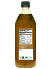 DAANA sesame oil bottle label close-up, showcasing USDA Organic certification.