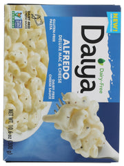 Daiya Alfredo Style Mac and Cheese sauce pouch being poured into a bowl
