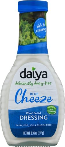 Daiya Blue Cheeze Dressing pour illustrating versatile, plant-based drizzle.