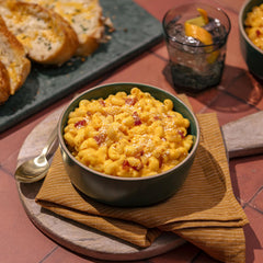 Daiya dairy-free cheddar mac ready-to-serve bowl for cozy family dinners.
