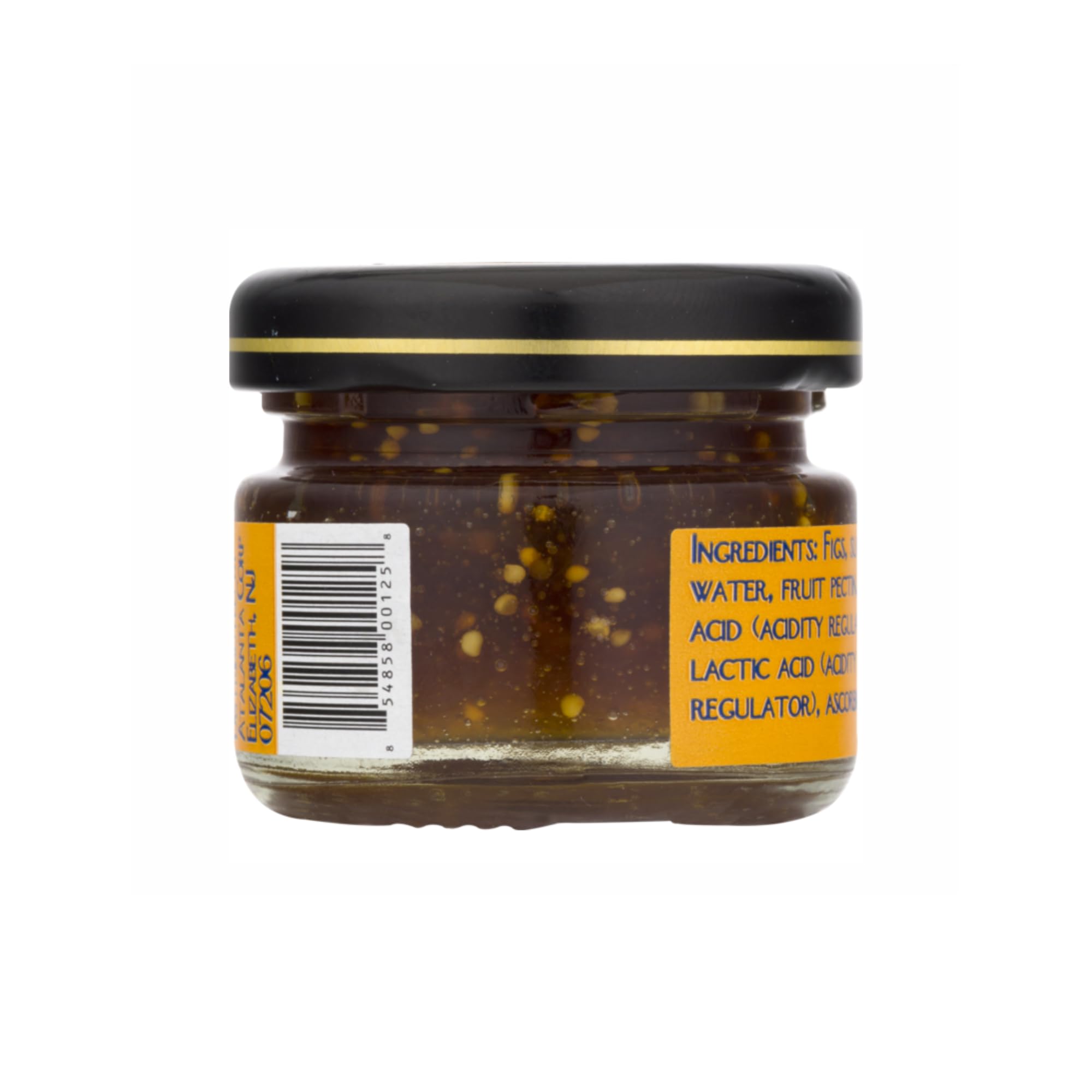 Dalmatia Mini Fig Spread beside cheeses on board for pairing