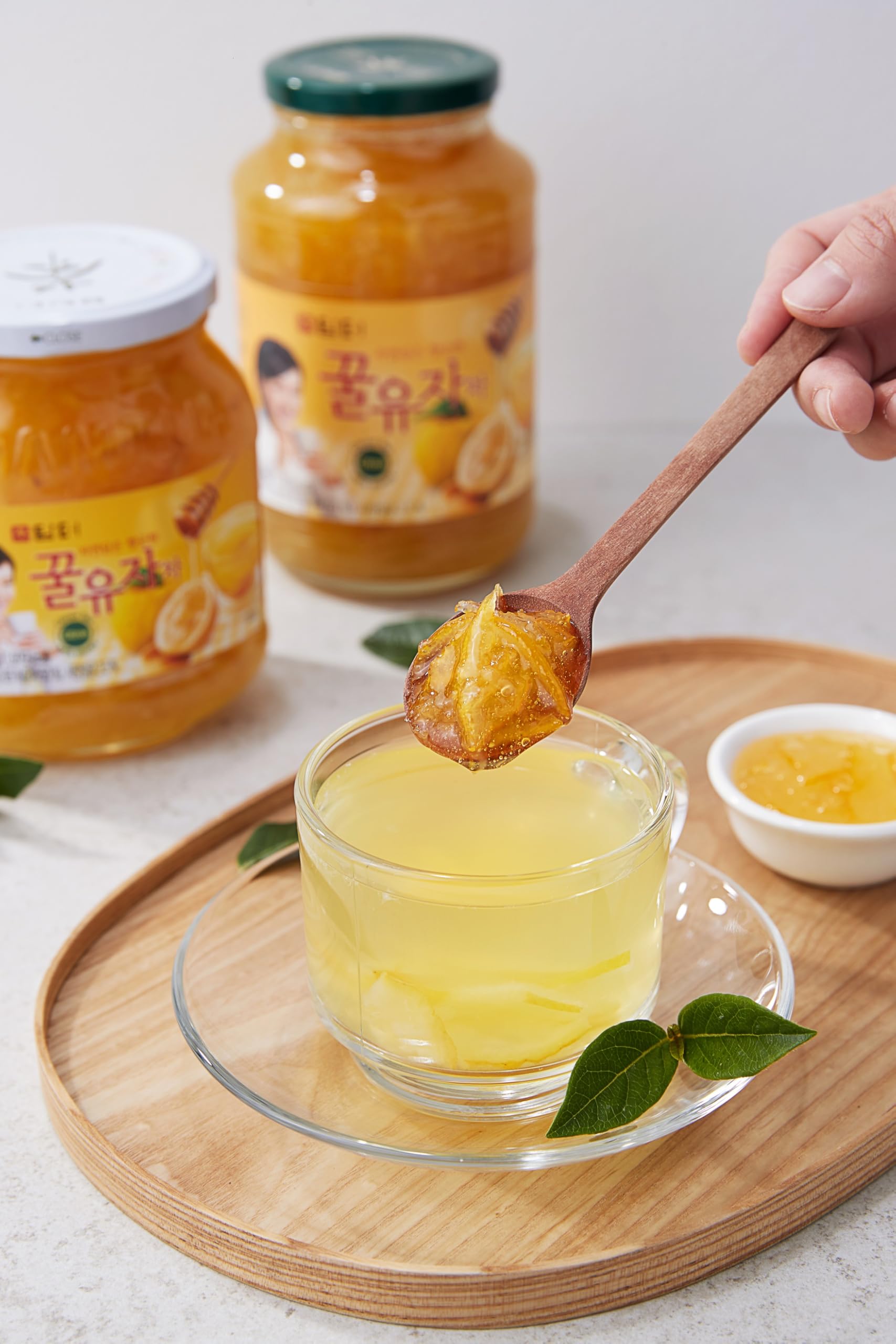 Spread of Damtuh Honey Citron Tea on toast for a citrus honey twist.