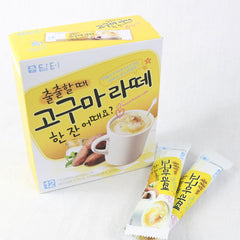 Damtuh latte mix dissolving into hot water, creamy swirl forming.