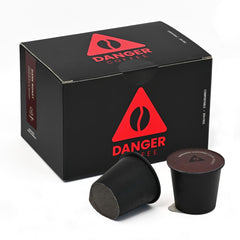 Danger Coffee dark roast pods pack front, convenient eco-friendly single-serve brewing.
