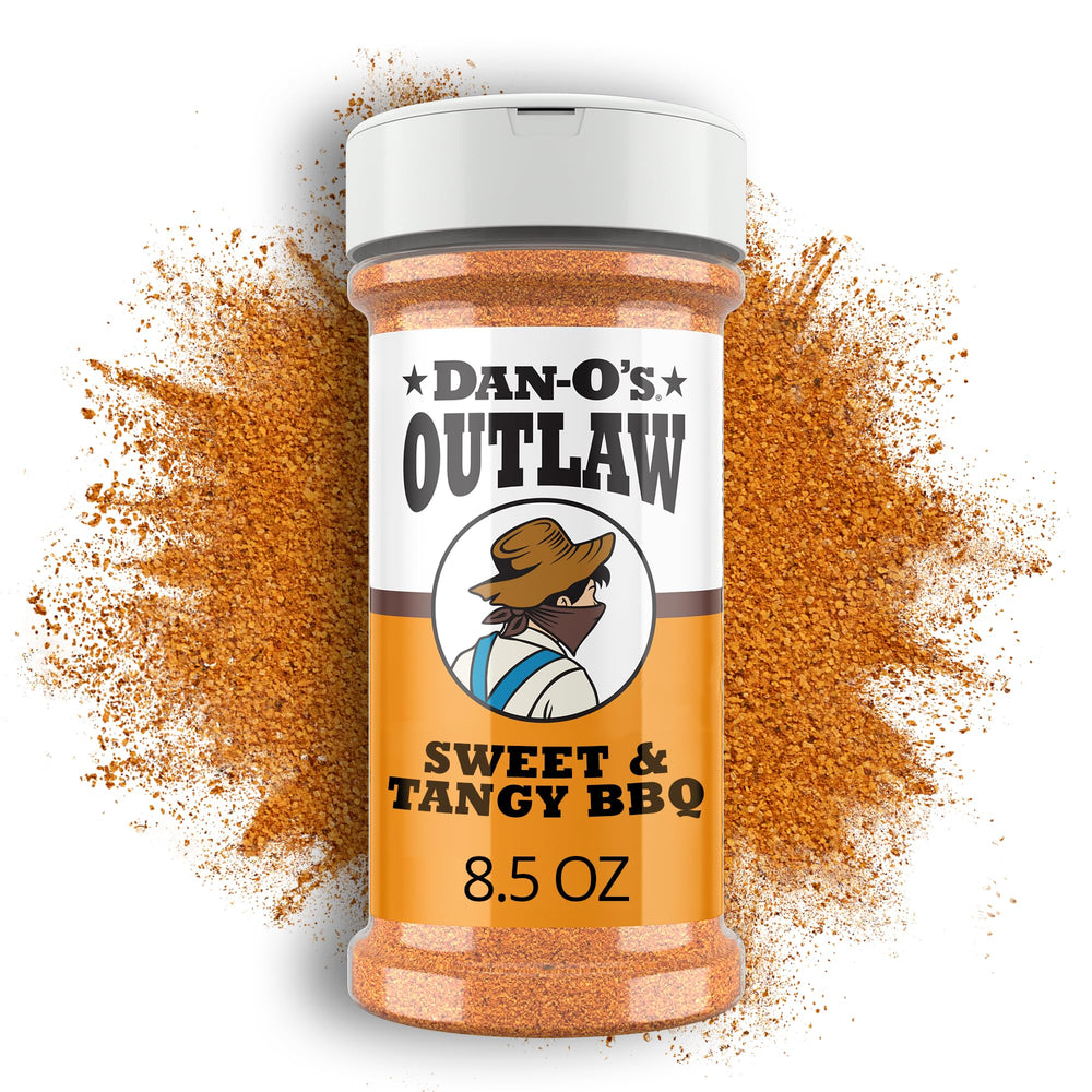 Dano's Outlaw Sweet & Tangy BBQ jar on the counter boosts pork flavor on the grill