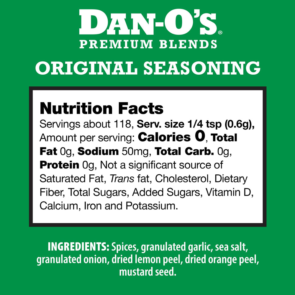 Pouring Dan-O's Seasoning from the bottle to boost grilling flavor.