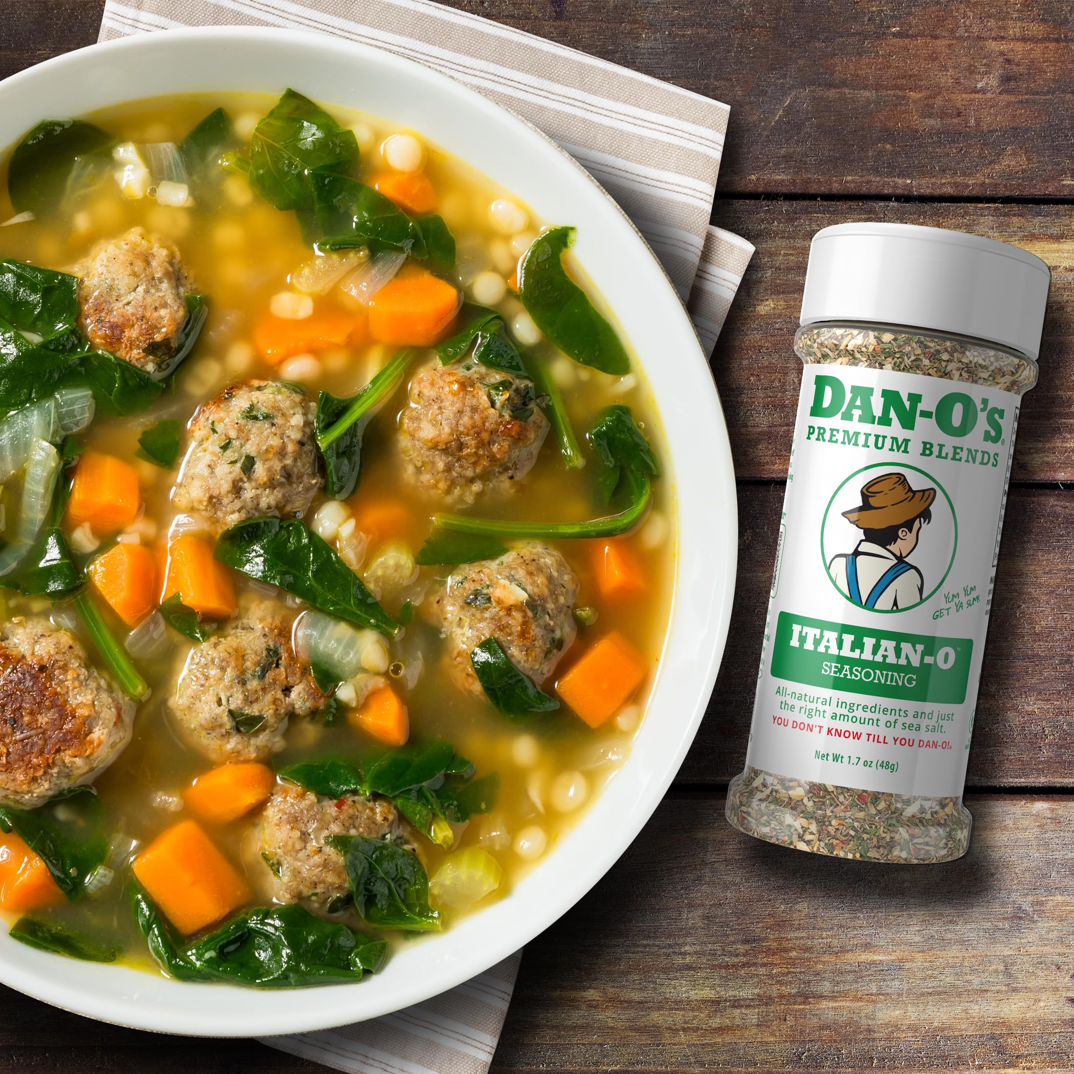 Sprinkling Dan-O's Italian-O on pizza for aroma boost