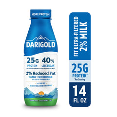 Darigold FIT bottle being poured into a glass to showcase creamy texture.