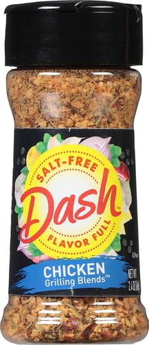 Skewers over grill with Dash Salt-Free Grilling Blend seasonings.