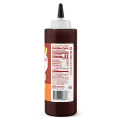 Date Lady BBQ sauce being poured over grilled chicken