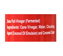 Datu Puti Cane Vinegar pour captures smooth drizzle for marinades and seafood