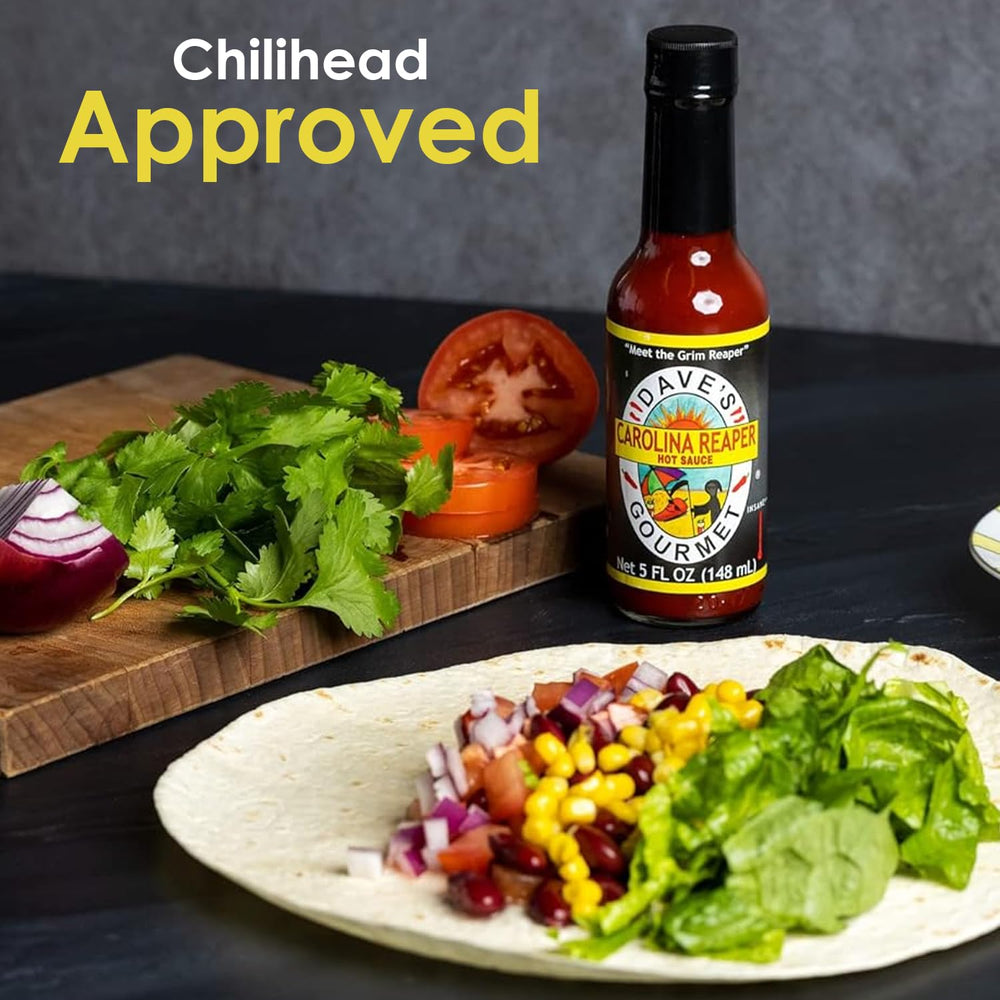 Dave's Gourmet Carolina Reaper Hot Sauce enriches chili and sauces with heat.
