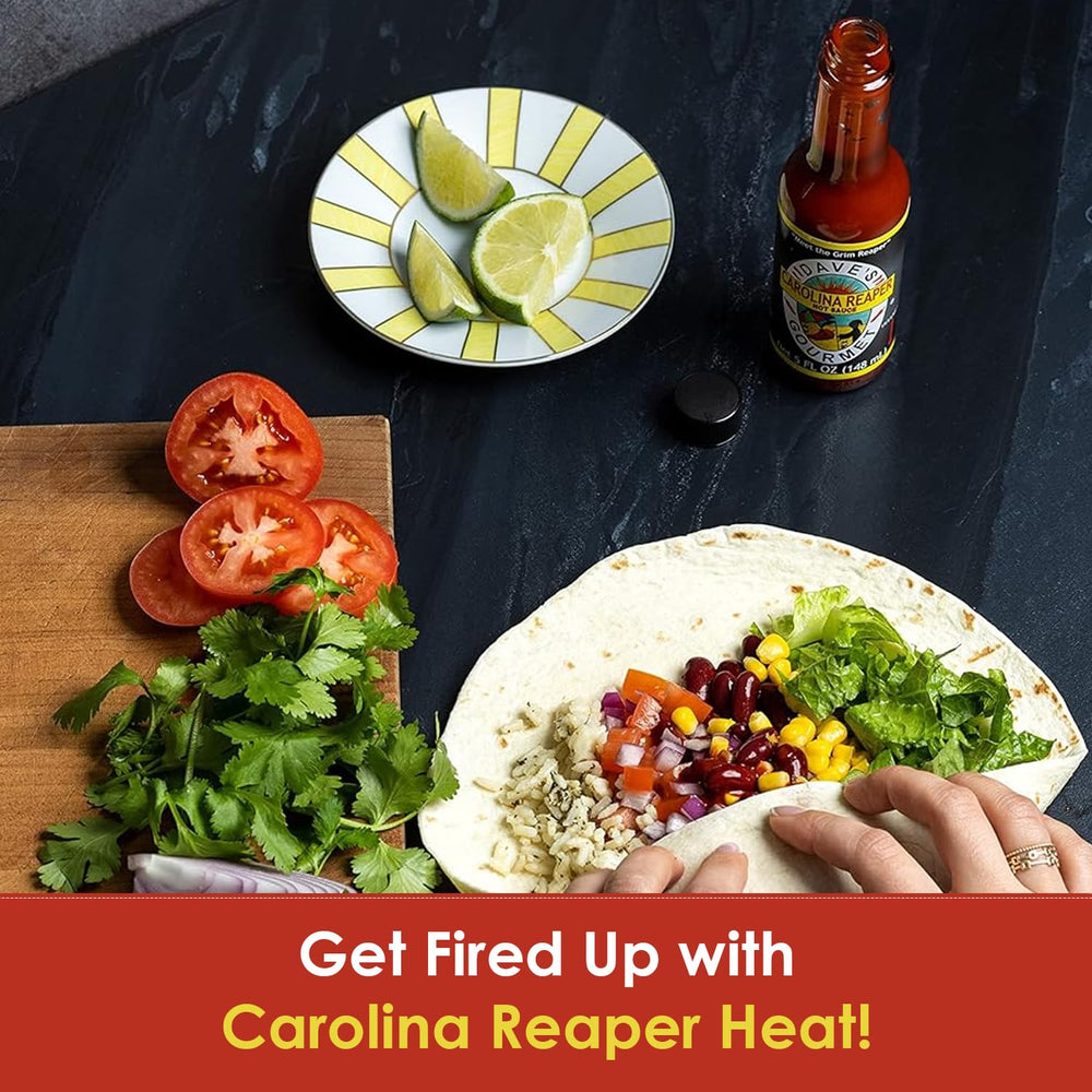 Dave's Gourmet Carolina Reaper Hot Sauce bottle for marinating meats with kick.