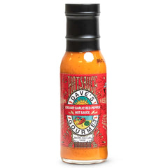 Dave's Gourmet Creamy Garlic Red Pepper Sauce bottle with creamy texture and medium heat for everyday meals.