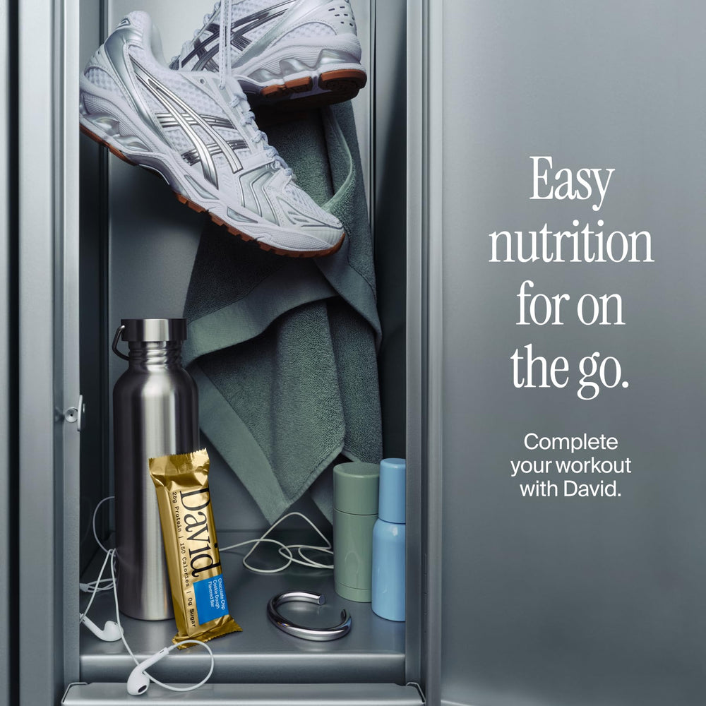 David High Protein Bars cake batter pour shot illustrating convenient on-the-go snack.