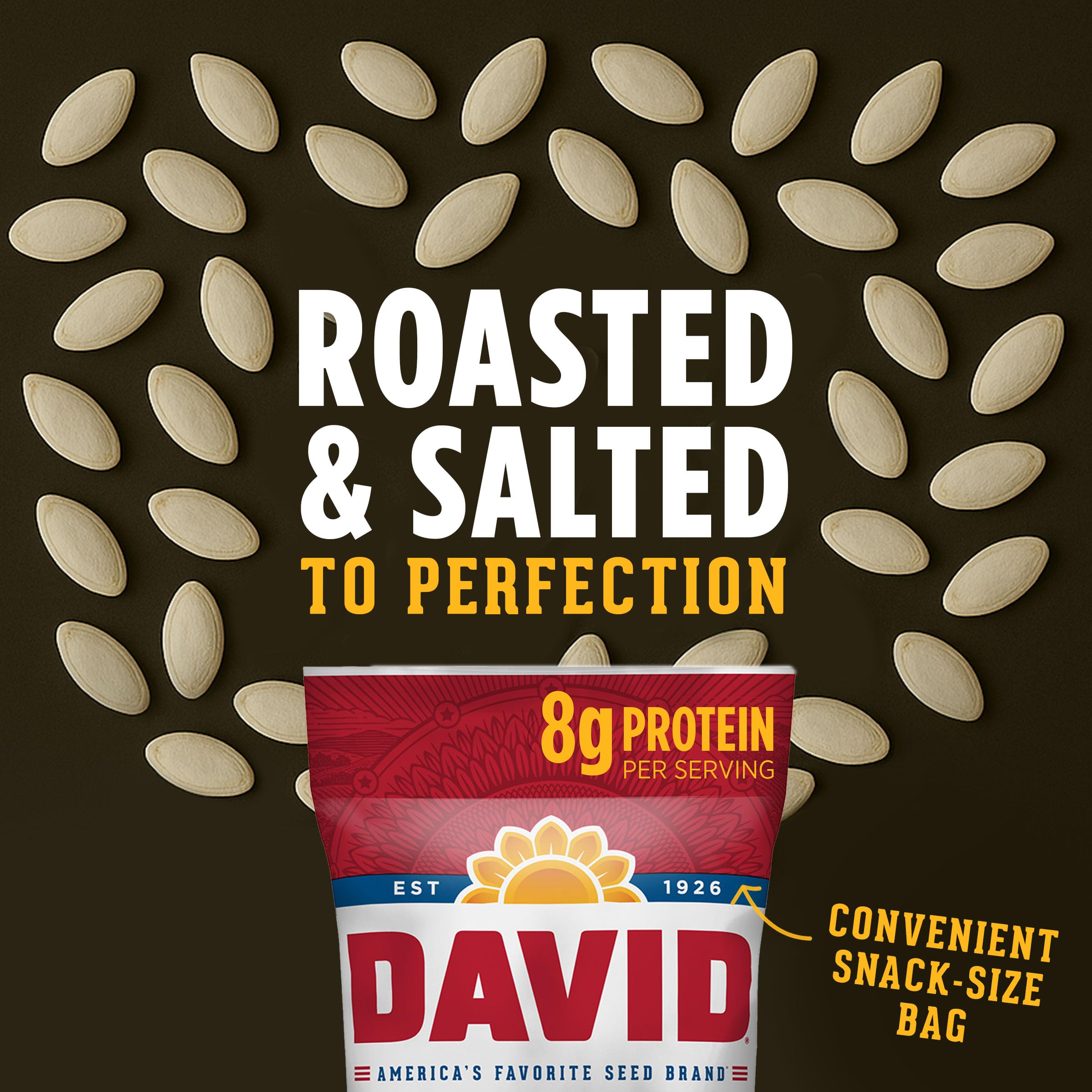 Hand reaching for a DAVID pumpkin seeds snack during a break.