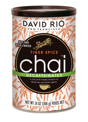 Chai mix poured into hot water for creamy dairy-free latte