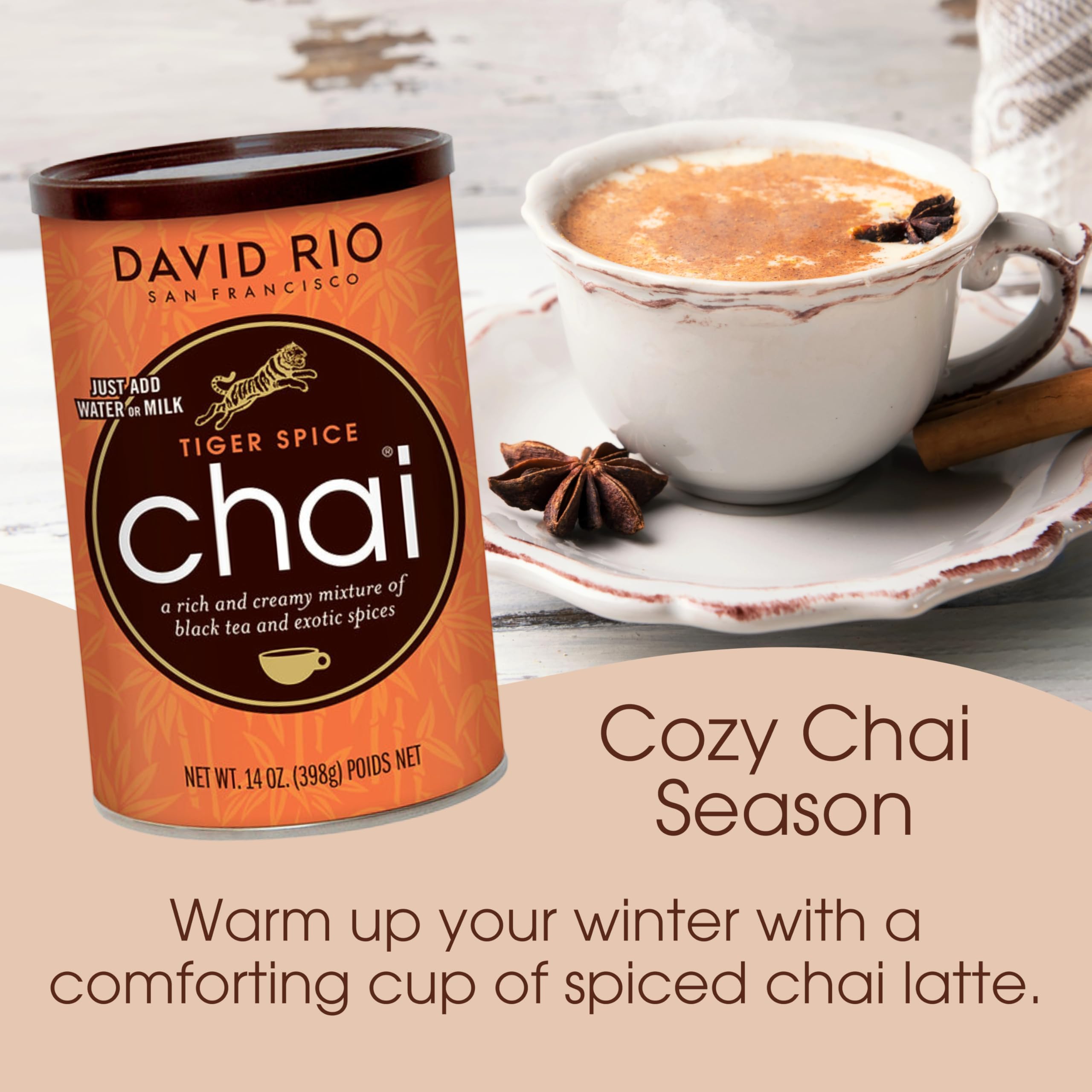 Chilled iced Tiger Spice Chai poured from a glass with lemon