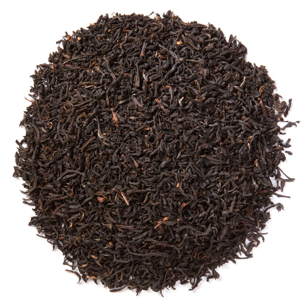 Davidson's Assam Banaspaty Estate—tea pour into cup highlights bold aroma and malty finish.