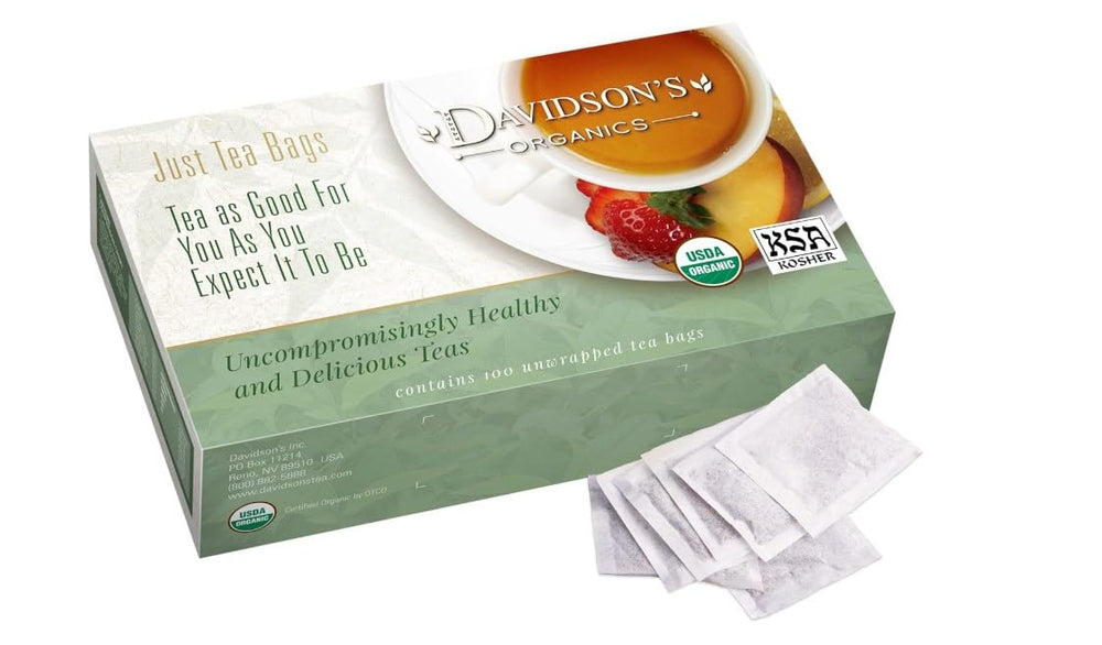 Davidson's Organics hibiscus flowers close-up with rosy brew and tart notes.
