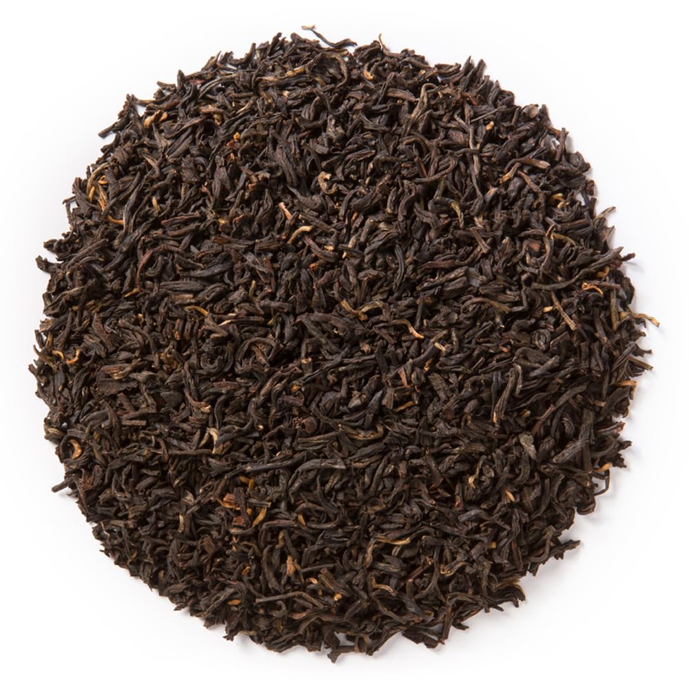 Davidson's Organics Yunnan Black tea being poured for a full-bodied finish