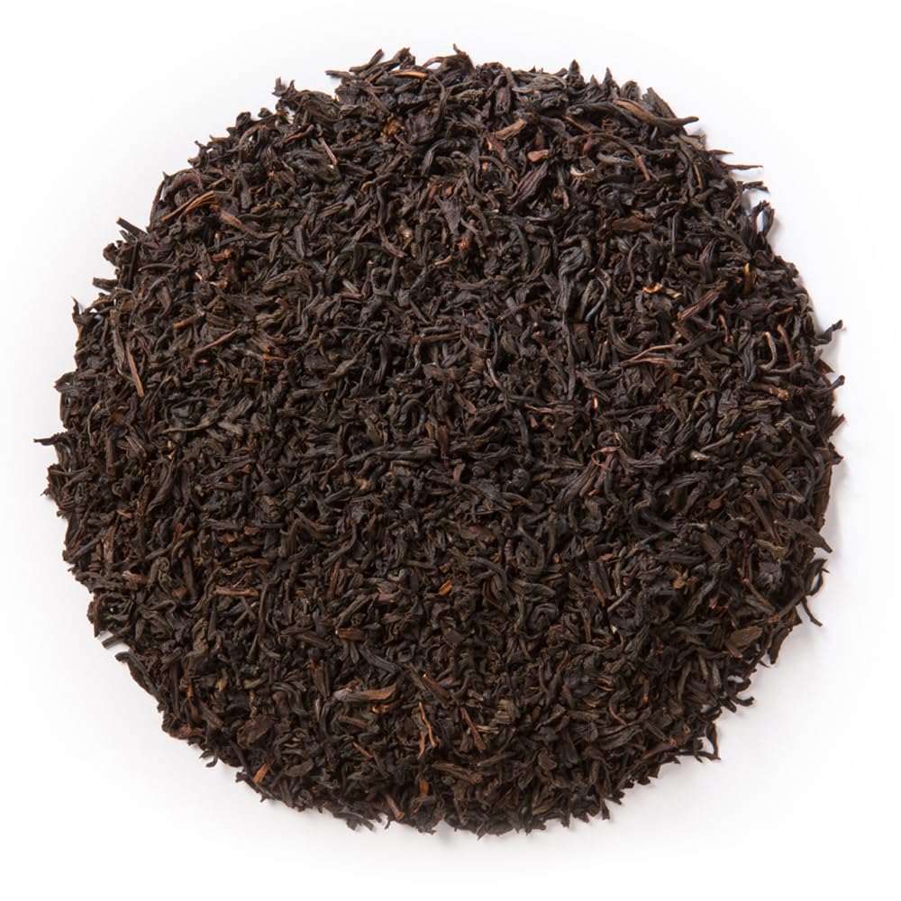 Davidson's Russian Caravan loose leaves steeping in a mug with a delicate smoky aroma.