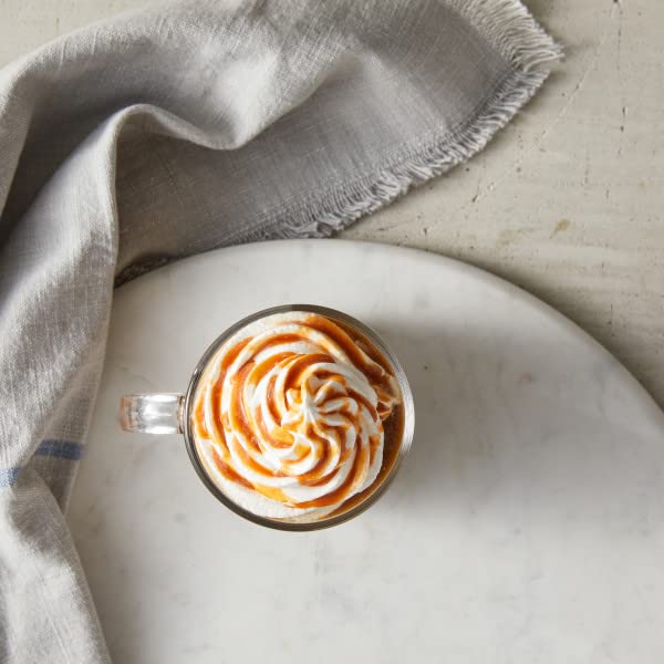 DaVinci Gourmet Classic Caramel Sauce poured on ice cream for sweetness.