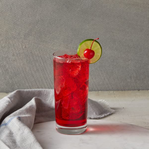 Classic Cherry Syrup pour close-up showing smooth mixing in hot beverages.