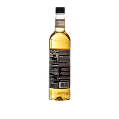 DaVinci Gourmet Classic Vanilla Syrup being poured for smooth drizzle on drinks