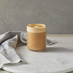 Coffee cup enhanced with DaVinci Classic White Chocolate Syrup for a creamy boost