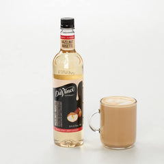 DaVinci Gourmet Hazelnut Syrup with a steam rising coffee cup