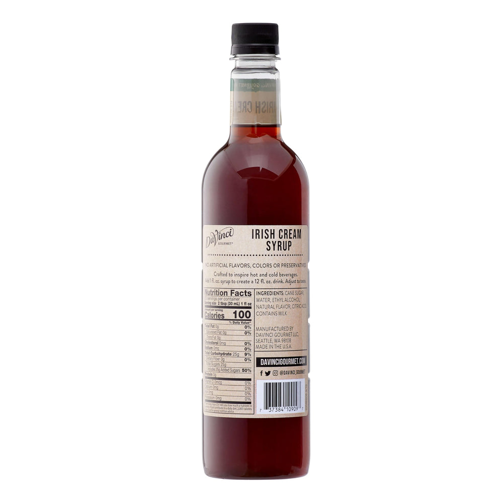 Pouring DaVinci Gourmet Naturals Irish Cream syrup for a rich beverage topping