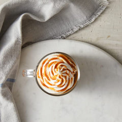 DaVinci Gourmet Pumpkin Pie Sauce drizzle on whipped cream elevates dessert presentation.