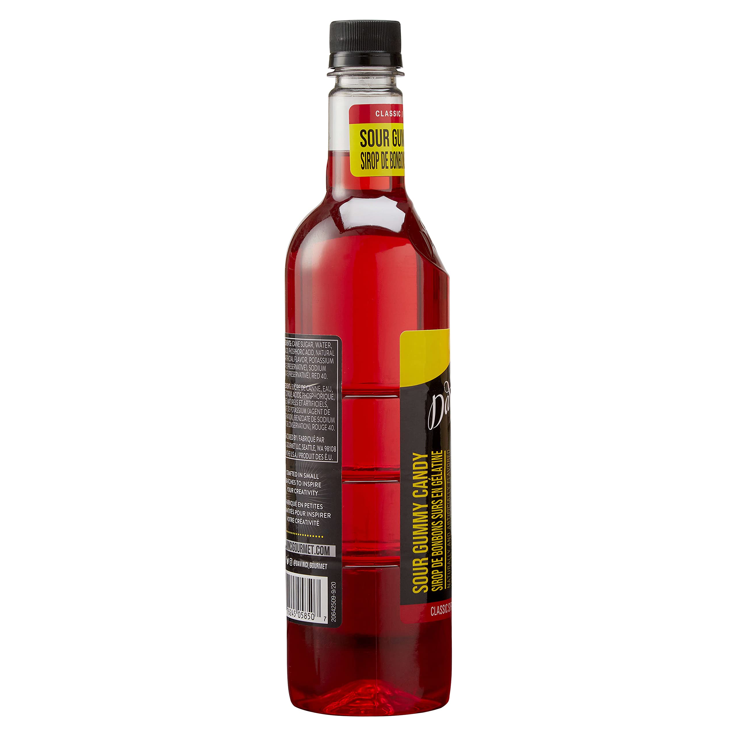Splash of sour gummy syrup over a glass for a playful beverage.
