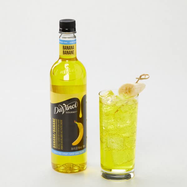 DaVinci Gourmet Sugar-Free Banana Syrup bottle pour showing smooth consistency for hot or cold beverages.