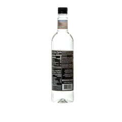 DaVinci Gourmet Sugar-Free Cinnamon Syrup being poured for hot or cold drinks.