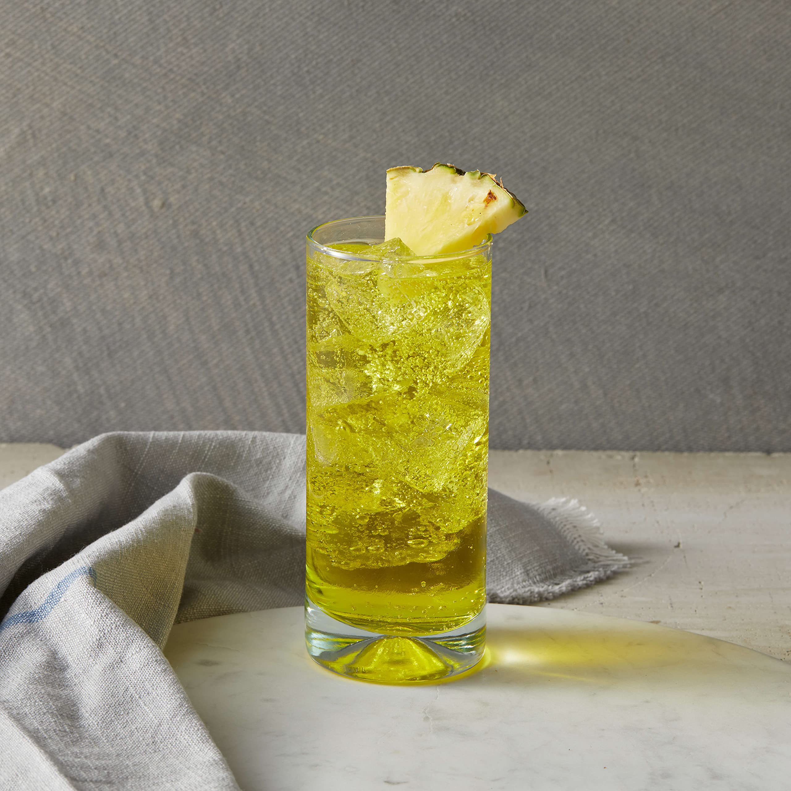 DaVinci Gourmet pineapple syrup added to tea for a fruity twist
