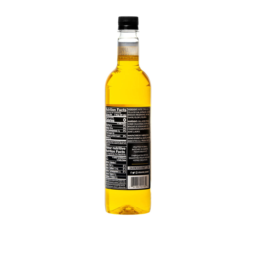 DaVinci Gourmet sugar-free pineapple syrup being poured into a hot coffee