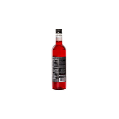 Pouring DaVinci Gourmet Sugar-Free Strawberry Syrup into a cup for flavor.