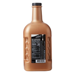 DaVinci Gourmet Sweet Cream being poured into coffee to enhance flavor.
