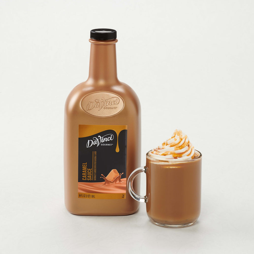 Tilted bottle shows the 64 oz size of DaVinci Gourmet Sugar Free Caramel Sauce.