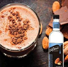 Pouring DaVinci Gourmet Sugar-Free Almond Syrup emphasizing versatile flavor.